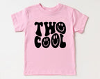 Pink t-shirt with 'Two Cool' text on a white background
