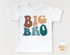 White t-shirt with 'BIG BRO' in colorful letters on a white background