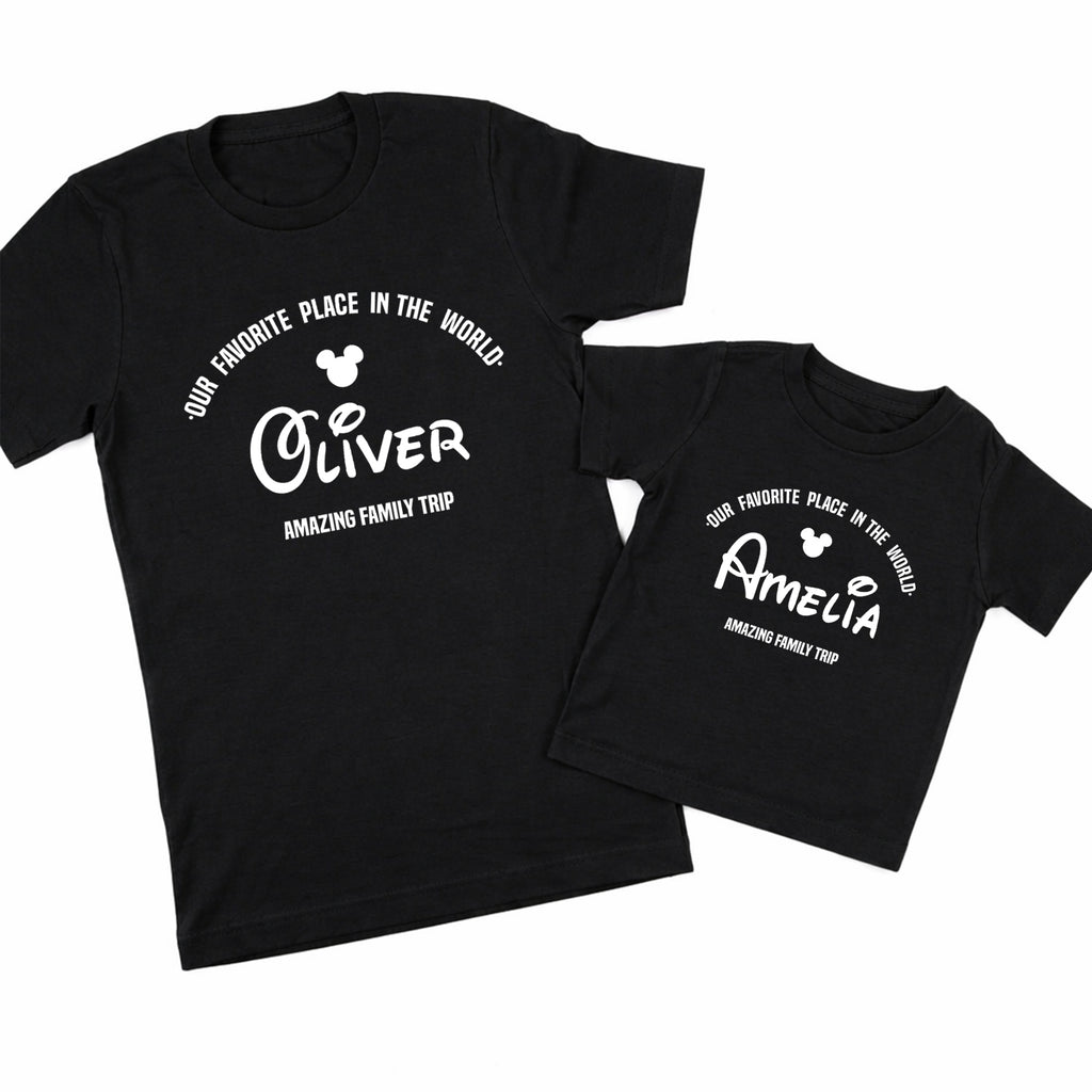 Two black t-shirts with white text and Mickey Mouse icons on a white background