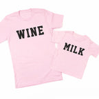 Two pink t-shirts, one with 'WINE' and the other with 'MILK', on a white background.