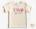 Beige t-shirt with 'TW Wild' text and flower design on a white background