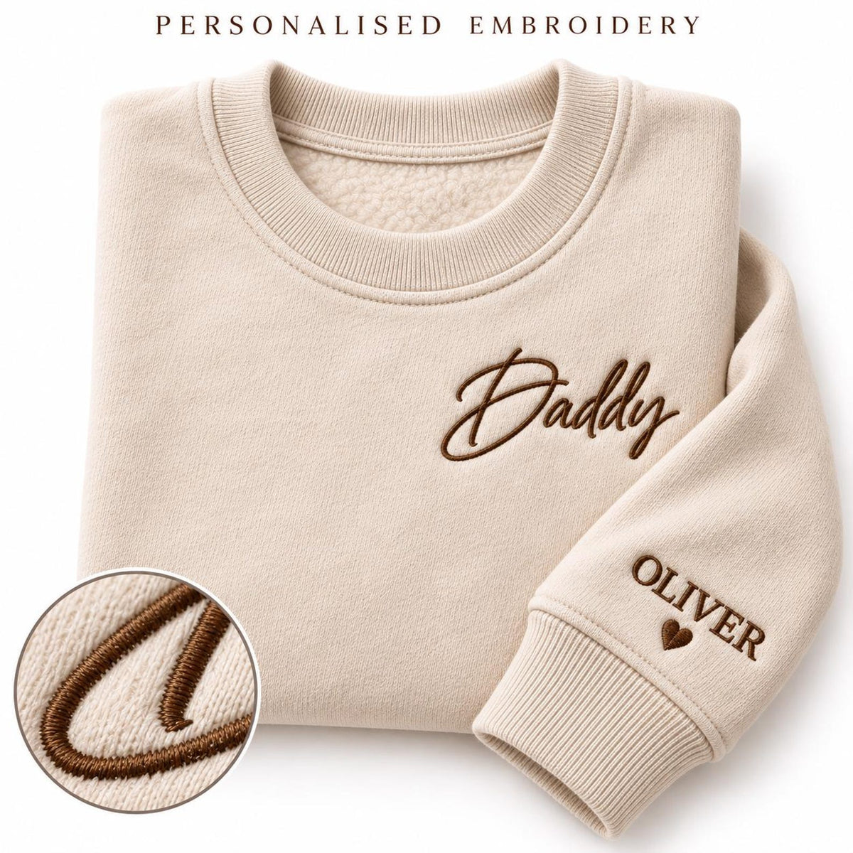 Natural beige Daddy sweatshirt with brown chest embroidery and Oliver name with a heart on the sleeve.