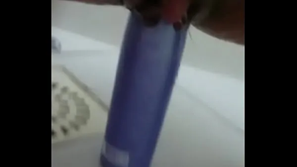 New Stuffing the shampoo into the pussy and the growing clitoris total Movies