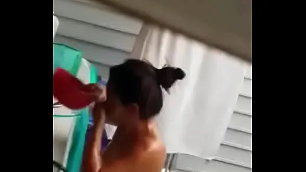 Skupno Young girl being filmed taking a shower novih filmov